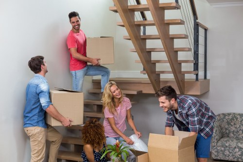 Local removal team loading furniture for a same day move
