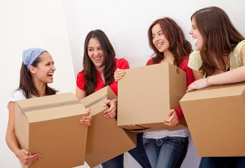 Unpacking support helping a customer settle into a new Roehampton home