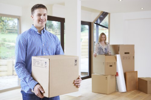 Removalists planning a house move in Roehampton with packed boxes and furniture