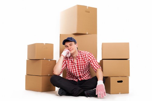 Packed moving boxes ready for transport in Roehampton