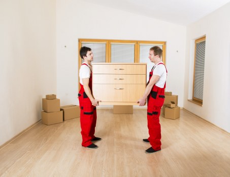 Careful loading of household items for Roehampton removals